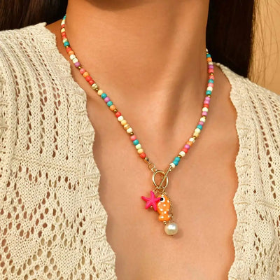 Boho Halskette mit bunten Perlen & Meeres-Charme – Fisch & Seestern Anhänger